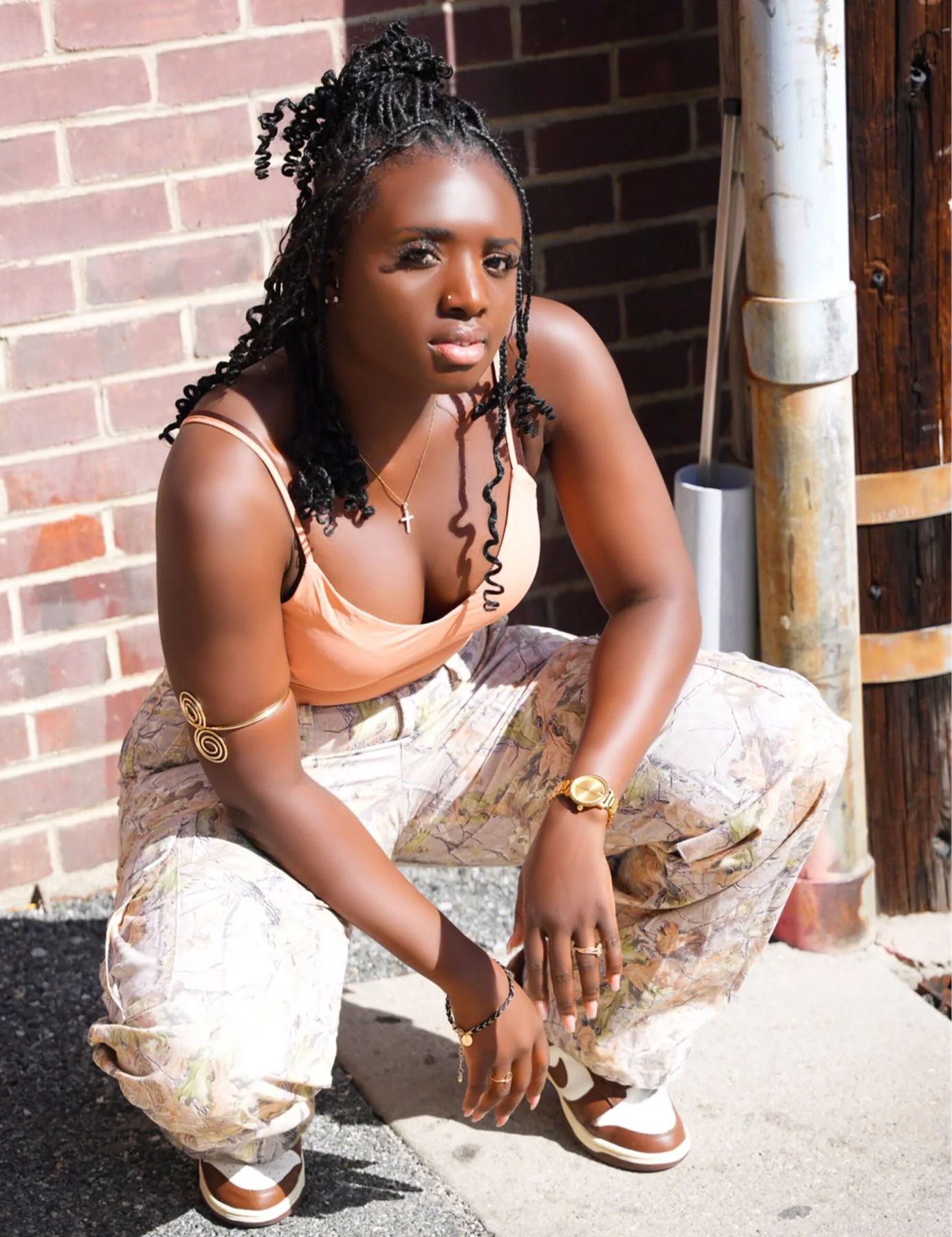 DJ Akuaa posing during a fashion photoshoot